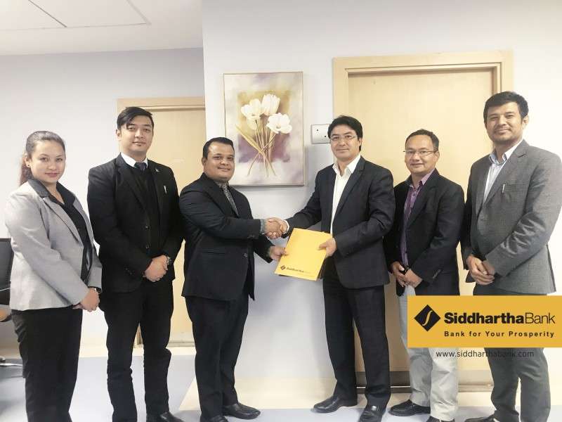 Siddhartha Bank, Nepal Medicity Hospital Sign Agreement