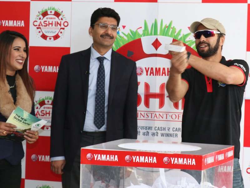 Cricketer Sharad Vesawkar announces the winner of Yamaha’s lucky draw winner under its Dashain Offer on Tuesday. The company informed that Shiva Raj Tharu won a brand new Skoda Rapid car under the scheme. Photo Courtesy: Yamaha