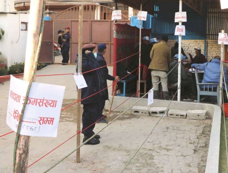 Election officers making preparations at a polling center in Thapathali, Kathmandu on the eve of the parliamentary and provincial polls on Wednesday. Security has been beefed up for Thursday’s elections. Photo: PRadip Luitel/Aarthik Abhiyan