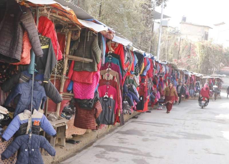 Clothes up for sale at Chabahil Ganeshthan in Kathmandu on Sunday. Photo: PRadip Luitel/Aarthik Abhiyan