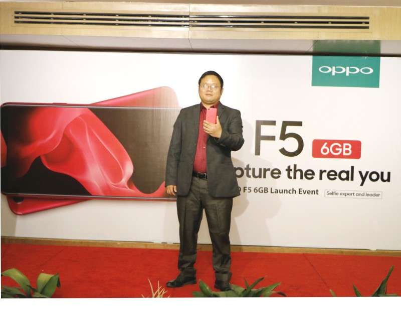 A representative of Oppo Nepal launches the Oppo F5 6GB Red Edition in Kathmandu on December 11. The smartphone which is priced at Rs 44,990 comes with features for personalising beautification for better selfie images. Photo Courtesy: Oppo Nepal