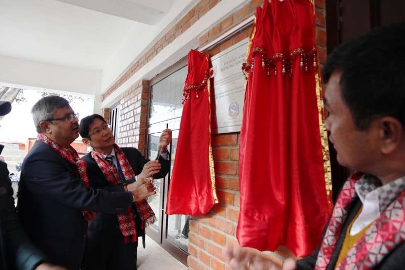 Jun Sakuma, chief representative of JICA Nepal and Madhu Prasad Regmi, secretary at the Ministry of Education, jointly inaugurating new buildings of Path Pradarshak Secondary School in Badikhel, Lalitpur on Tuesday, December 19. Photo Courtesy: JICA
