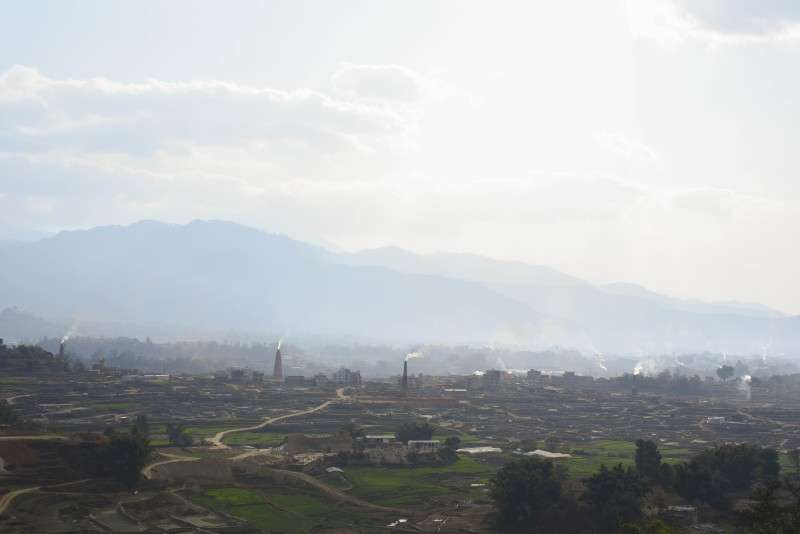 Smoke billowing from brick kilns in Bhaktapur in this recent photo. The production of bricks increases during winter than other times of the year. Photo: Sagar Basnet/NBA