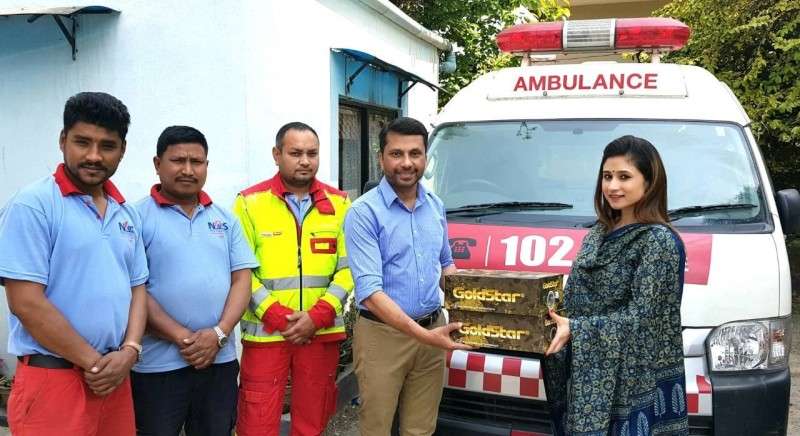 Director of Kiran Shoe Manufacturer Vidushi Rana hands over Goldstar’s jungle boot to medical technicians working with the Nepal Ambulance Service on Friday. Photo: Kiran Shoe Manufacturer