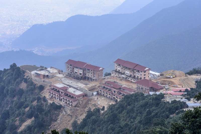 Construction of a new hotel at Chandragiri hill targeting tourists visiting the area which has become a popular destination recently after the introduction of cable car. Photo: Sagar Basnet/NBA