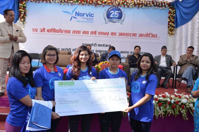 Norvic Hospital during its silver jubilee celebration on Saturday hands over a cheque of Rs 2.5 million to women journalists attempting to climb Mt Everest this season. Photo Courtesy: Norvic Hospital