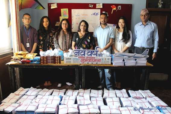 Representatives of Himalaya Airlines pose for a photo with Prayas Nepal officials after providing support to the latter in terms of  kitchen utilities and a yearlong supply of notebooks for the children under the airline’s CSR. Photo Courtesy: Himalaya Airlines 