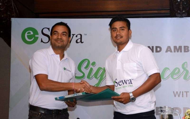 Cricketer Gyanendra Malla poses for a photo after being declared as brand ambassador of eSewa in the capital on Monday. Photo Courtesy: eSewa