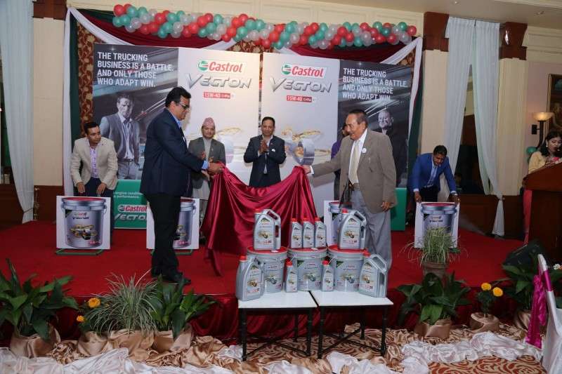 This handout photo shows representatives of Nepal Overseas Trading Concerns unveiling Castrol's Vecton amid a function in Kathmandu on Thursday. The new lubricant is specifically introduced for bus, trucks, tipper and other heavy vehicles. 