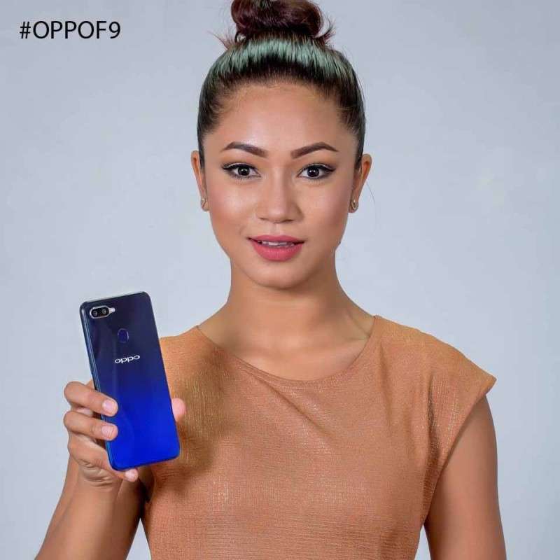 This handout photo shows winner of Boogie Woogie Nepal, Kabita Nepali, with an OPPO F9 phone. She will be among the few celebrities to attend the launch of the new model of smartphone in the  Nepali market on August 29.