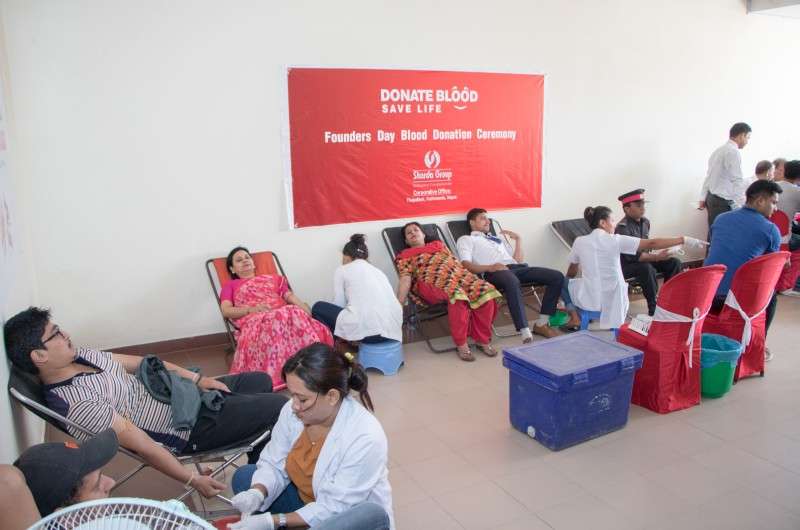 People donating blood during a programme organised by Sharada Group on its premises on Monday. Photo: Pradip Luitel/NBA