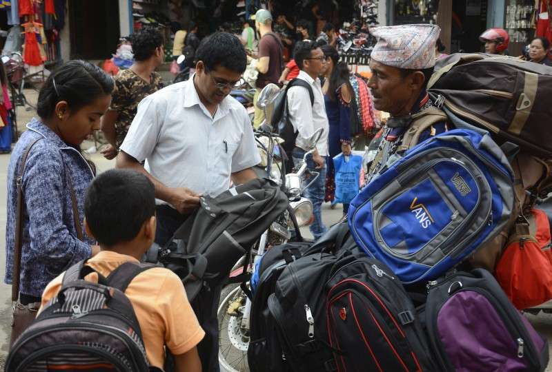 A vendor selling bags in Lalitpur on Sunday. Photo: Ravi Maharjan/NBA