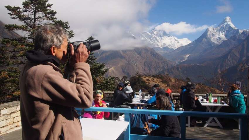 Mt Ama Dablam is seen in the background as tourists visit the Everest View Hotel at Syangboche, Solukhumbu. The government has banned solo trekking for tourists recently keeping in mind the safety of the tourists. 