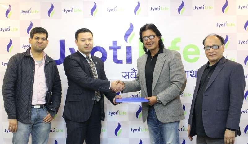 This handout photo provided by Jyoti Life Insurance Company shows the company representatives after appointing film star Rajesh Hamal as its brand ambassador during a function in the capital on Wednesday. 

