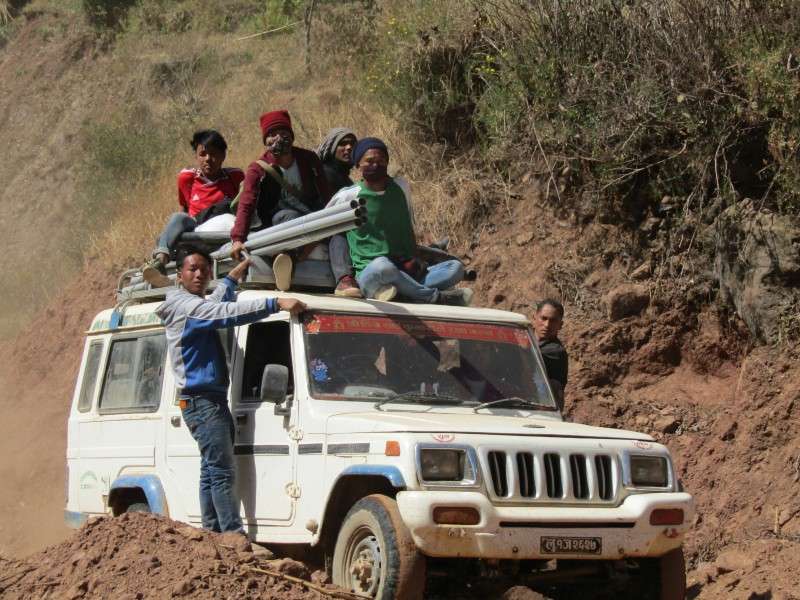 Passengers travelling in risky condition from West Rukum’s capital Musikot to East Rukum’s Taskera in this recent photo. Vehicles carry passengers beyond their capacity as there isn’t adequate number of vehicles in the region. Photo: Prabir Dalel/NBA